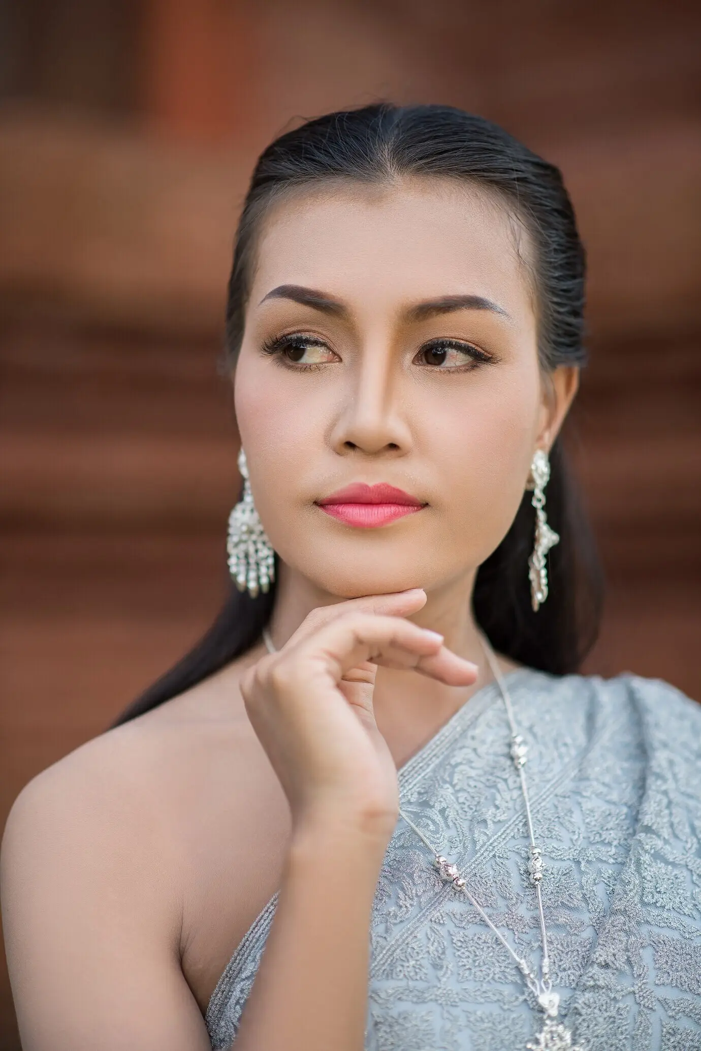A beautiful woman in typical Thai dress.